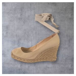 Christian Louboutin Canvas Braided Accents Espadrilles
Women's Size: 37